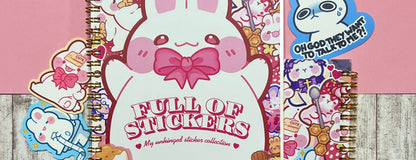 Sticker book titled 'Full of Stickers' with various cute animal-themed stickers on a wooden surface.